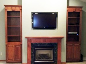 Custom made built in home entertainment center by Mischler and Sons  Construction